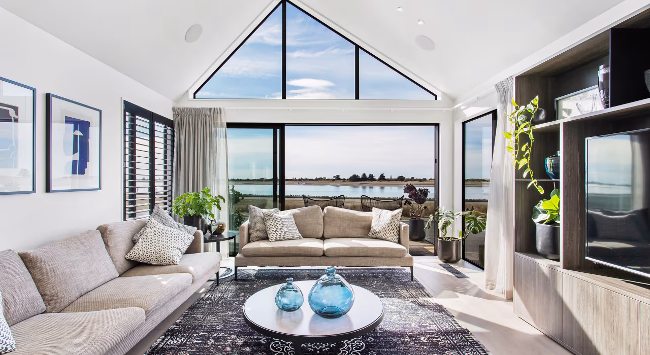 <img alt="Light filled living room with high gabled ceiling, large glazing framing sea and estuary views, Redcliffs Christchurch." src="/images/d/o/n/-/r/don-roy-site-architecture-moncks-lounge-area-35e8dd7f.webp" width="2560" height="1706" />